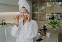 happy-woman-bathrobe-removes-collagen-patches-smiles-athome-beauty-routine-personal-care-joy_95891-14834-3462734
